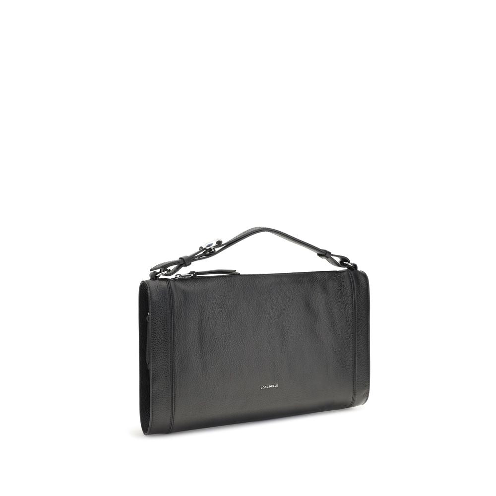 Coccinelle Black Calf Leather Bos Taurus Handbag with adjustable handle and silver logo, showcasing elegant design and grained leather trim.