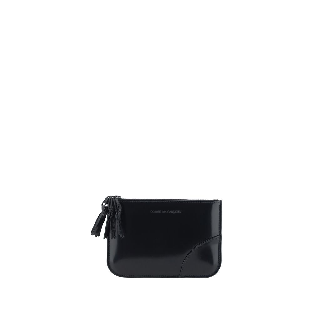 Comme Des Garçons Black Calf Leather Bos Taurus Wallet with zip closure and press-stamped logo.