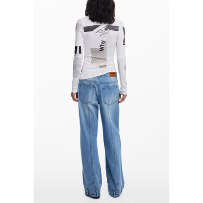 Desigual White Viscose Women T-Shirt with newspaper pattern from the back, paired with blue jeans, showcasing bold fashion statement.