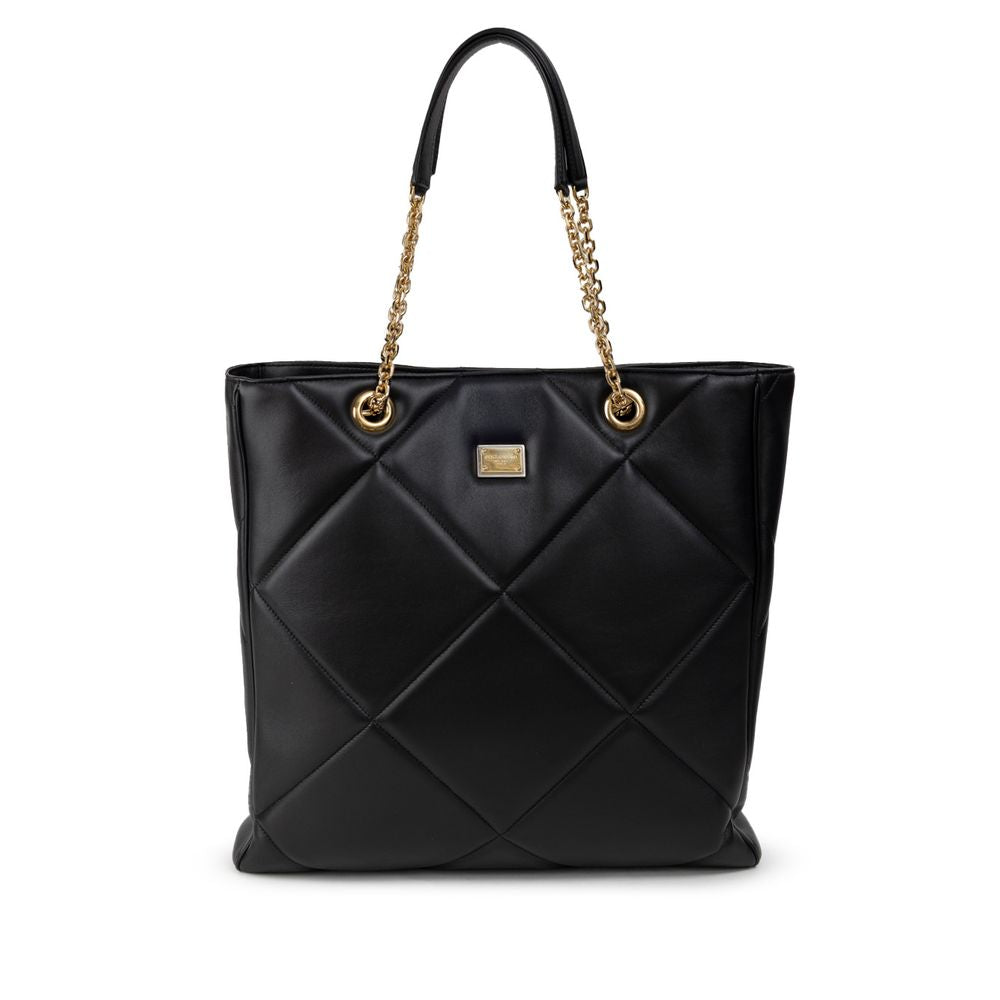 Dolce & Gabbana Black Leather Matelassé Tote Bag with gold chain handles and logo tag, featuring a single compartment and internal pockets.