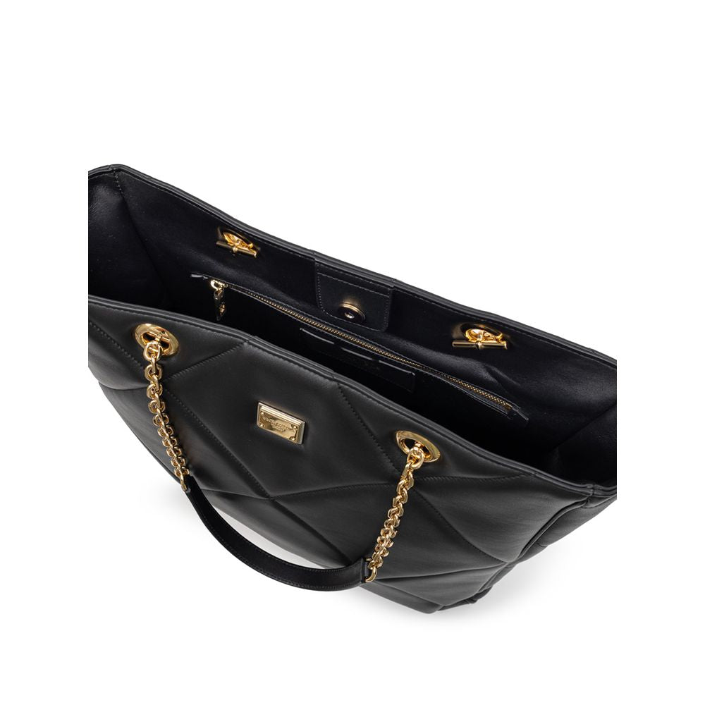 Dolce & Gabbana Black Leather Matelassé Tote Bag with gold chains, snap button, internal compartments, and logo tag.