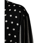 Detail of Dolce & Gabbana Black White Stripe Polka V-Neck Pullover Sweater, showcasing polka dots and striped pattern close-up.