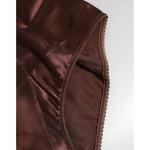 Close-up of Dolce & Gabbana brown silk high-waist girdle, showcasing luxurious stretch material and expert craftsmanship.