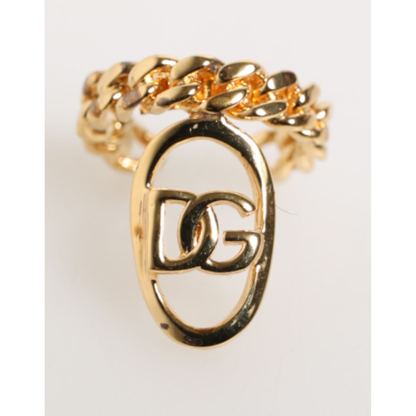 Dolce & Gabbana Gold Tone Brass Oval DG Logo Chain Adjustable Ring showcasing elegant design and sophisticated style.