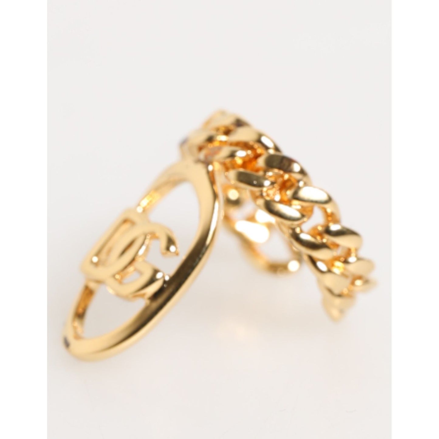 Dolce & Gabbana Gold Tone Brass Oval DG Logo Chain Adjustable Ring with curb chain style, elegant design, and iconic DG logo.