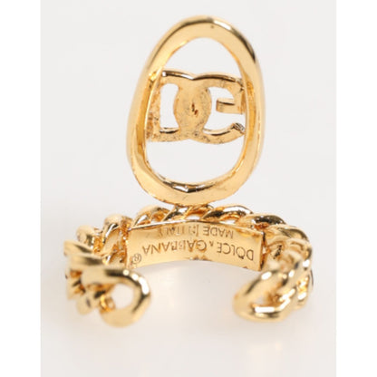 Dolce & Gabbana Gold Tone Brass Oval DG Logo Chain Adjustable Ring with curved chain band and DG logo, made in Italy.