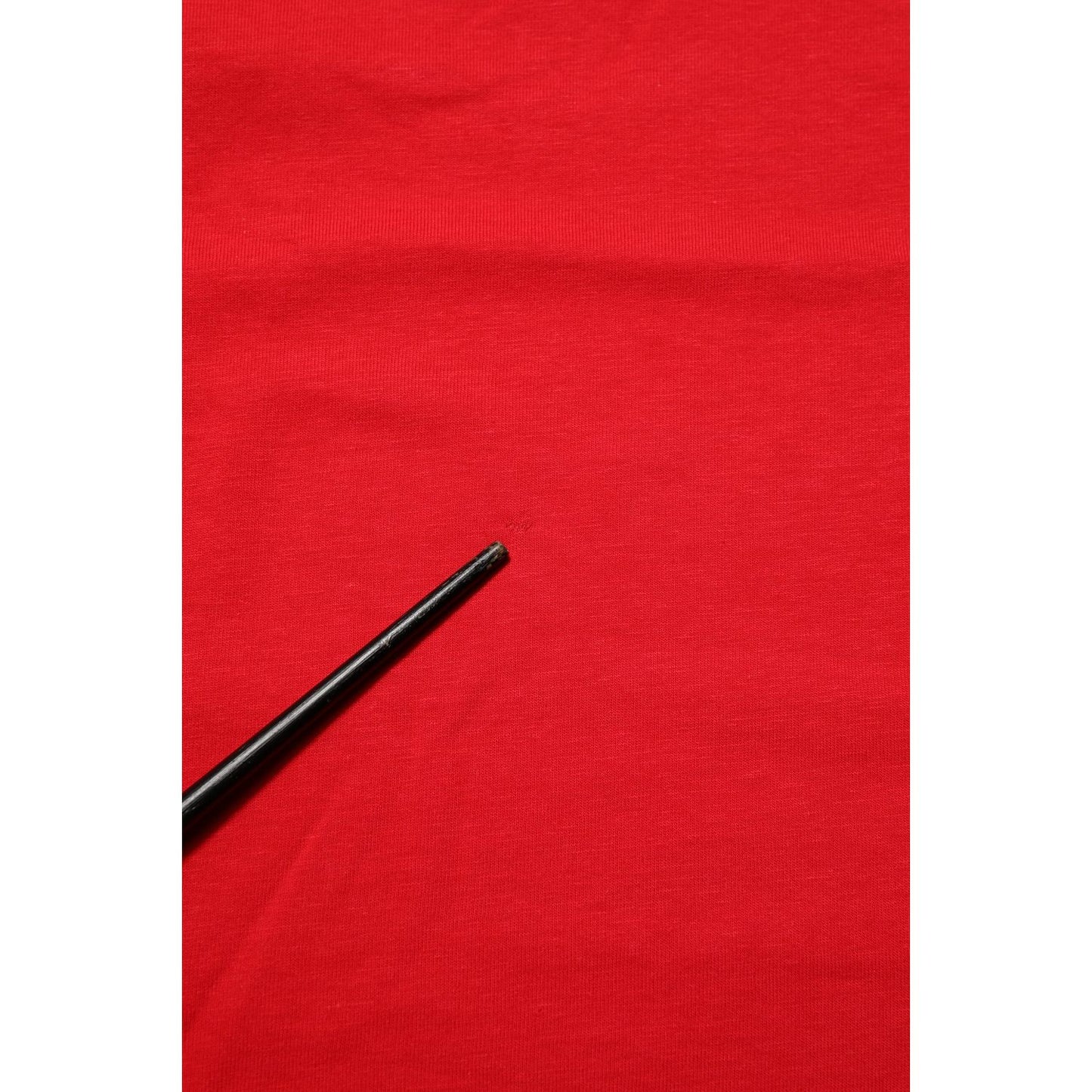 Close-up of Dolce & Gabbana Red Goodluck 2023 Cotton Crew Neck T-shirt fabric texture