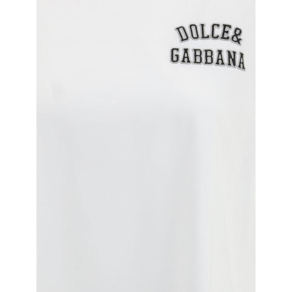 Dolce & Gabbana White Cotton T-Shirt with ribbed crew neck and chest patch logo, perfect for casual, stylish looks, 100% cotton.