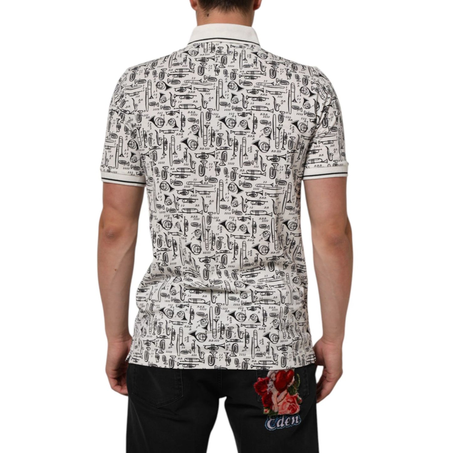 Back view of Dolce & Gabbana White Musical Print Collared Polo T-shirt with all-over musical instrument design and ribbed collar.
