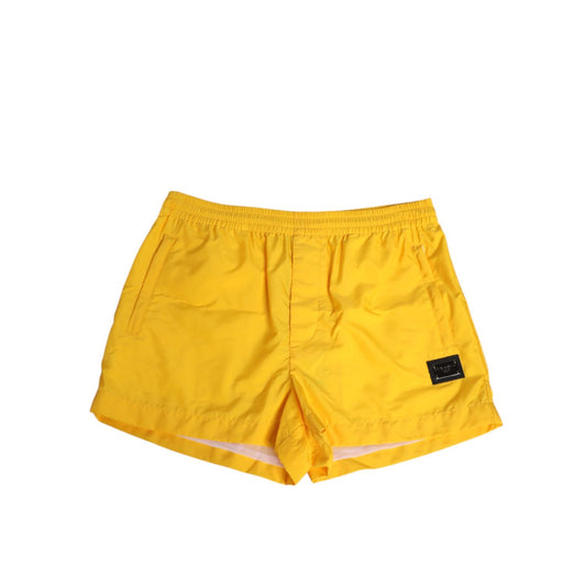 Dolce & Gabbana Yellow Nylon Logo Plaque Boxer Shorts Swimwear with logo plaque, perfect for beach and summer, elastic waistband.