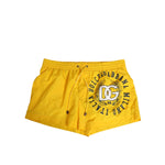 Dolce & Gabbana Yellow Nylon Logo Print Men Boxer Short Swimwear with elastic waistband and DG logo on front.