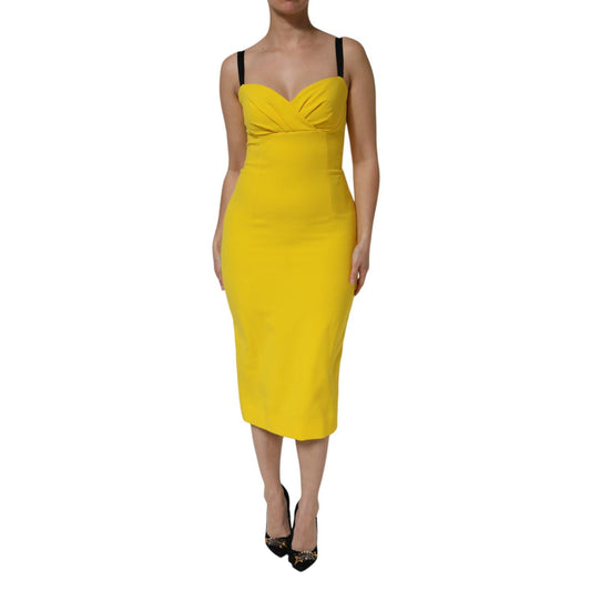 Dolce & Gabbana Yellow Polyester Sleeveless Sheath Midi Dress displayed on a model, featuring sleek design and vibrant color.