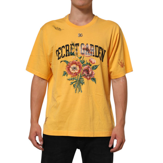 Dolce & Gabbana Yellow Secret Graden Floral Cotton CrewNeck T-shirt with floral print and crew neckline, worn by a male model.
