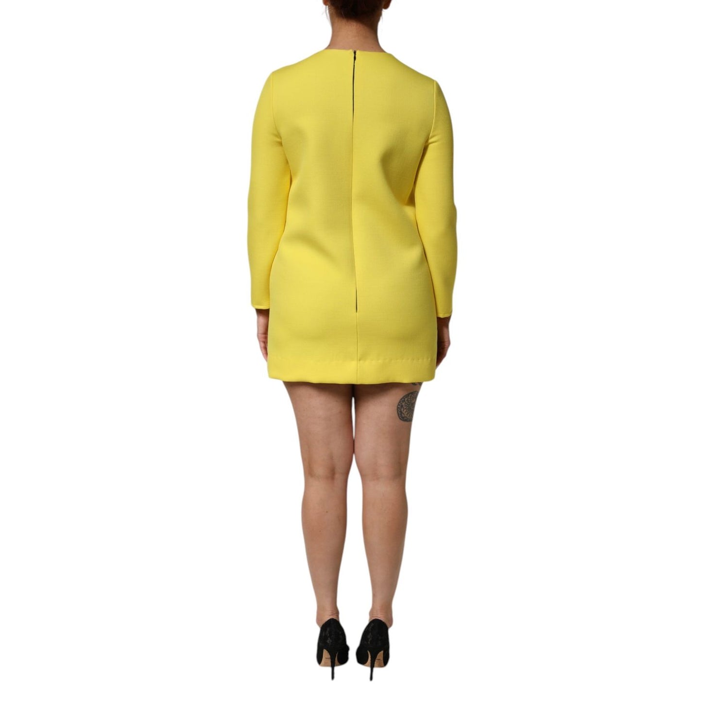Dolce & Gabbana Yellow Viscose Acetate Mini Long Sleeve Dress, back view, showing stylish zipper detail and vibrant color.