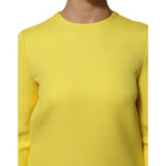 Dolce & Gabbana Yellow Viscose Acetate Mini Long Sleeve Dress with clean crew neckline, close-up view of front.