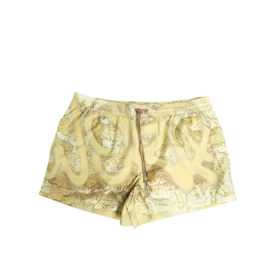 Dolce & Gabbana Yellow World Map Polyester Elastic Waistband Swimwear with graffiti print and logo details, front view.