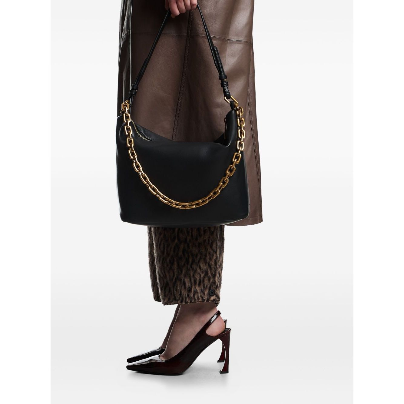 Emporio Armani Medium leather hobo bag with chain, black leather with gold-tone chain and zip fastening, shown with top handle.