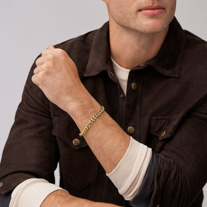 Man wearing FOSSIL JEWELS JEWELRY Mod. JF04616710 bracelet while posing.