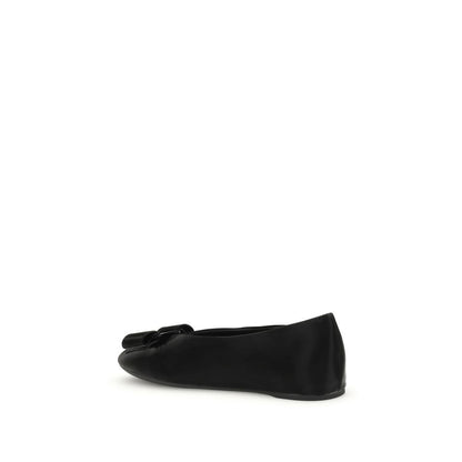 Side view of Ferragamo Black Calf Leather Bos Taurus Ballet Flats with Vara bow, showcasing elegant and versatile design.