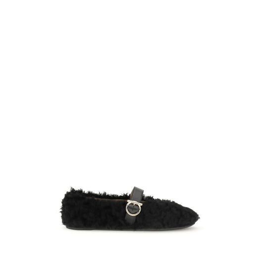 Ferragamo Black Fur Ballet Flats with Gancini buckle and curly shearling lining for AW25.