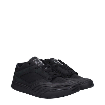 Givenchy Black Fabric Low Top Sneakers with logos, lace-up closure, rubber sole, and round toe.