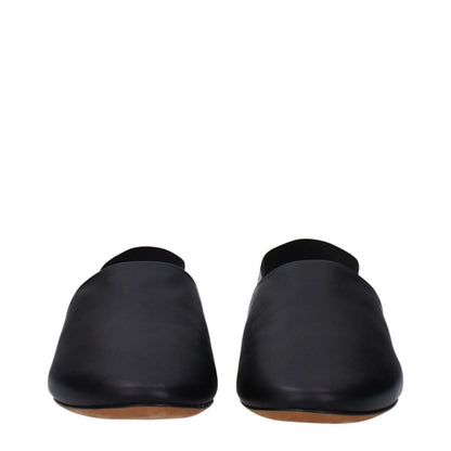 Front view of Givenchy Black Leather Slides with round toe design, featuring side and back logos. Casual style, low flat heel sandals.