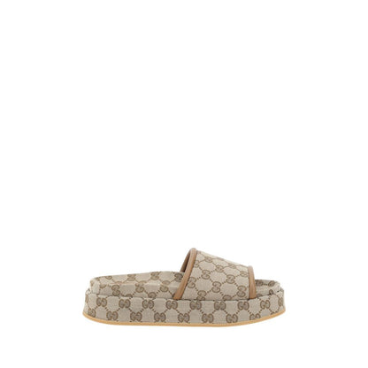 Gucci Beige Polyamide Flat Sandals with GG Supreme pattern, featuring leather trim and platform style for modern elegance and comfort.
