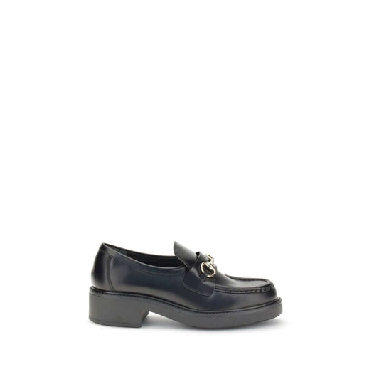 Gucci Black Calf Leather Bos Taurus Slip-On Loafers with iconic horsebit detail, perfect for elegant formal and everyday looks.