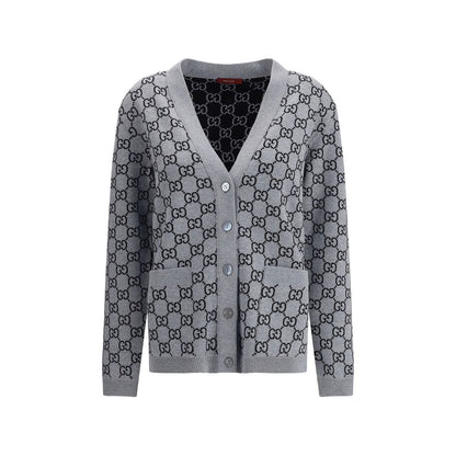 Gucci Black Wool Cardigan with GG pattern, V-neckline, and front pockets, perfect for smart or casual looks, in black and white.