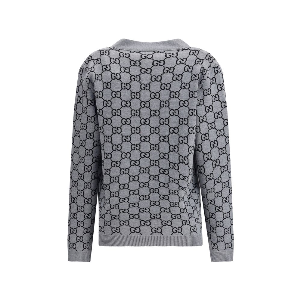 Gucci Black Wool Cardigan with GG Supreme pattern and ribbed trim, features a reversible design for smart or casual looks.