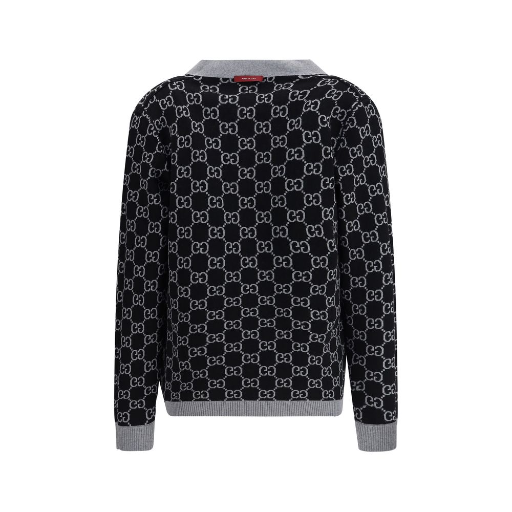 Gucci Black Wool Cardigan with GG Supreme pattern, back view, featuring V-neckline, low shoulders, long sleeves, and ribbed trim.