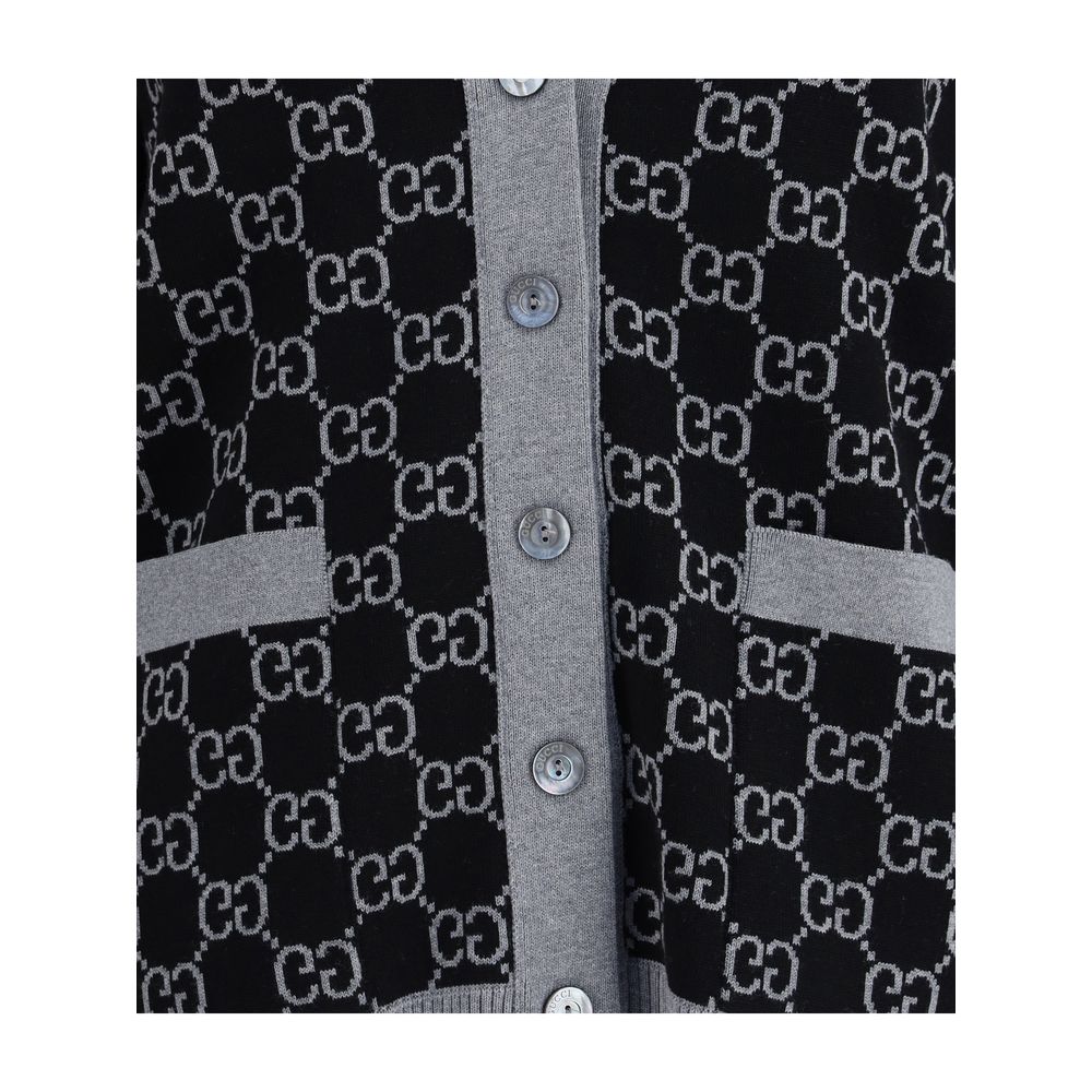 Gucci Black Wool Cardigan with GG Supreme pattern, V-neck, button closure, and front pockets in black and white tubular jacquard wool.
