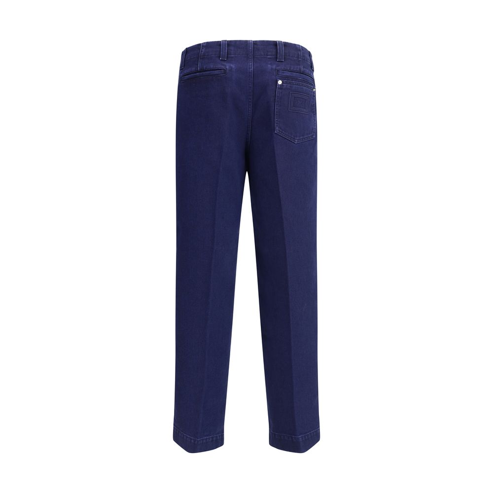 Gucci Blue Cotton Jeans Denim featuring embroidered logo on back pocket, tailored details, button closure, and straight hem for versatile style.