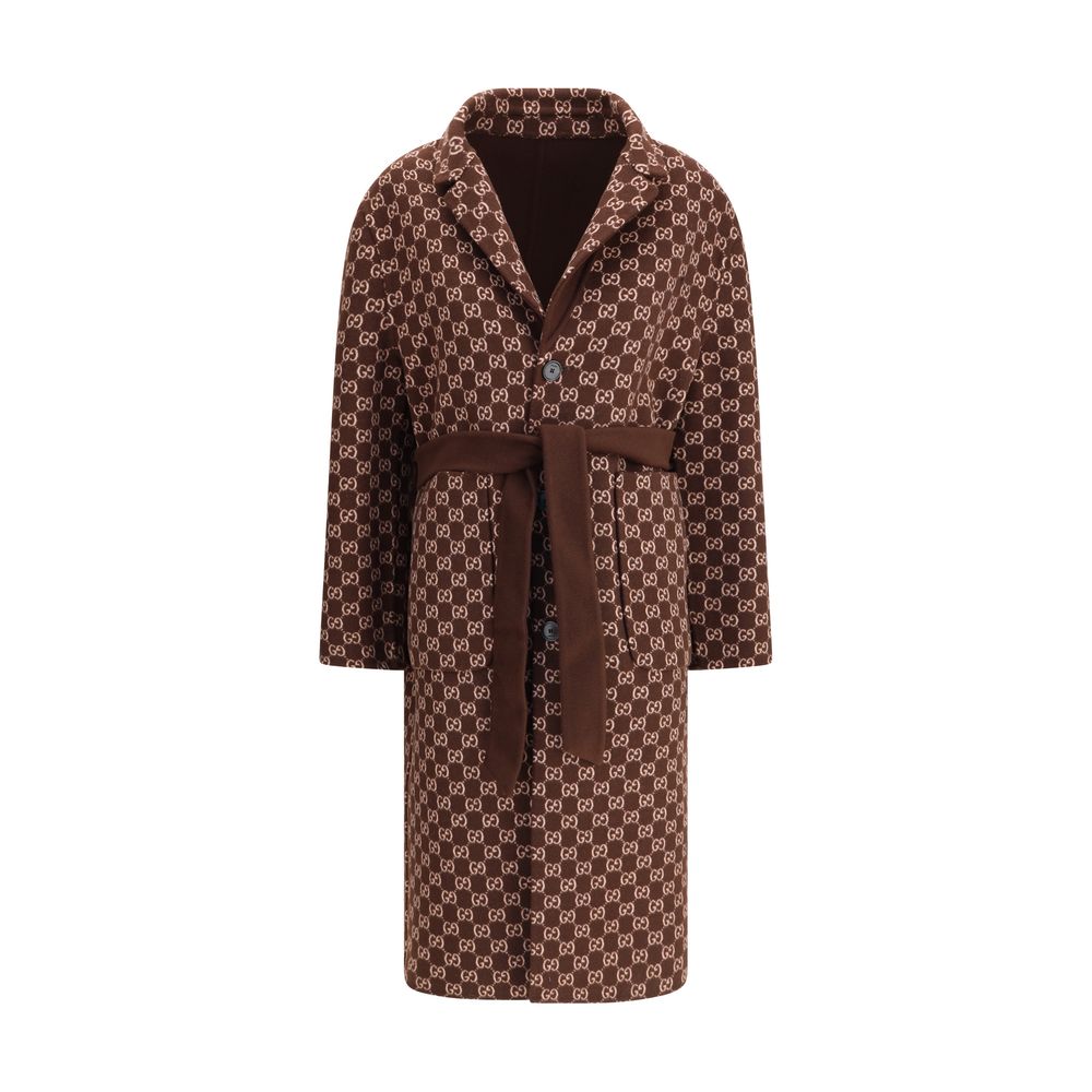 Gucci Brown Wool Coat with reversible silk-wool fabric, notch lapels, side pockets, and button closure, showcasing sophisticated elegance.
