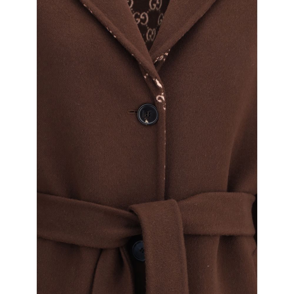 Gucci Brown Wool Coat with GG pattern and belt detail, showing the refined design and elegant button closure. Versatile and sophisticated.