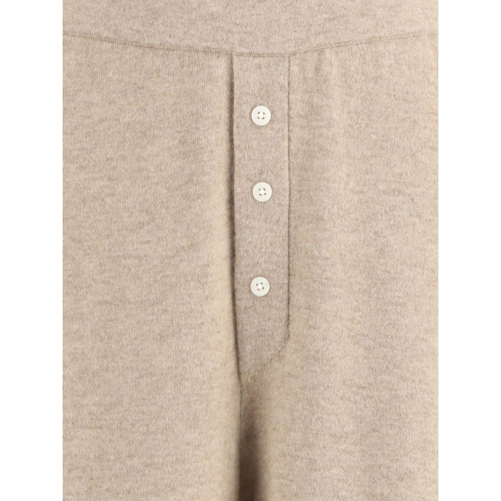 Close-up of Guest in Residence Beige Cashmere Casual Pants with button detail.