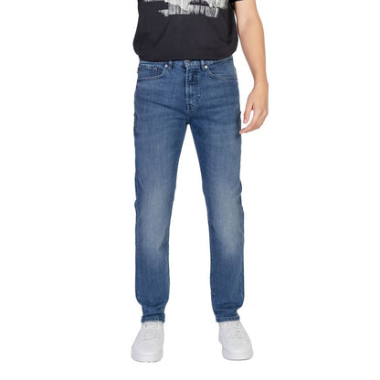 Hugo Boss Blue Cotton Relaxed Fit Jeans on model, showcasing modern style and comfort with regular loose fit for freedom of movement.