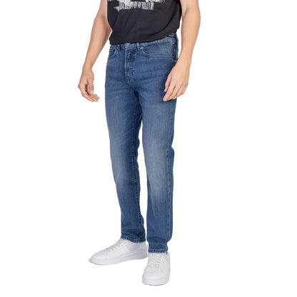 Model wearing Hugo Boss Blue Cotton Relaxed Fit Jeans showcasing modern style and comfort.