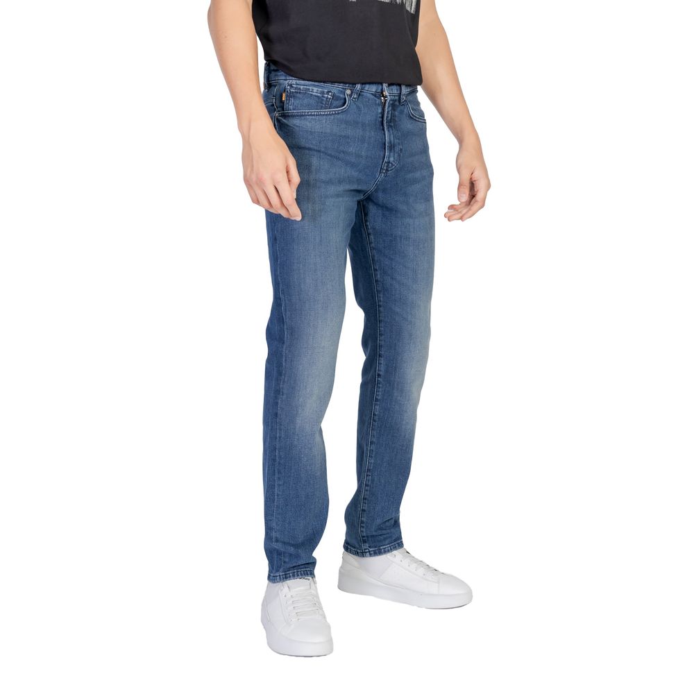 Model wearing Hugo Boss Blue Cotton Relaxed Fit Jeans showcasing comfort and contemporary style with a regular, loose fit.