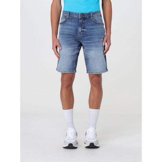Man wearing Hugo Boss Blue Denim Shorts showcasing comfortable fit and practical pockets for versatile style.