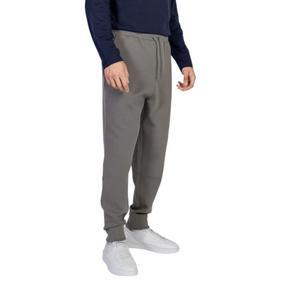 Hugo Boss Gray Cotton Joggers (Workout Pants) for men, featuring drawstrings and side pockets, perfect for comfort and style.