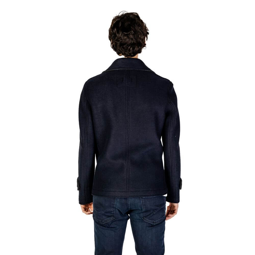 Front view with bag zipped and handles upright.
