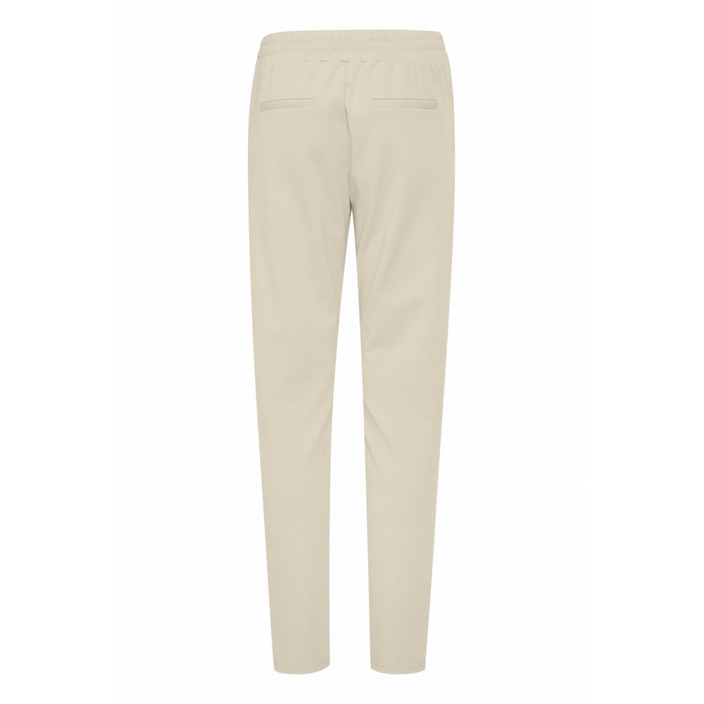 Back view of ICHI Beige Polyester Pants featuring elastic waistband and slim fit design.