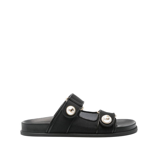 Jimmy Choo Fayence Sandal Low leather sandals with pearls, black rubber sole, double straps, faux pearl embellishments, and gold-tone hardware.