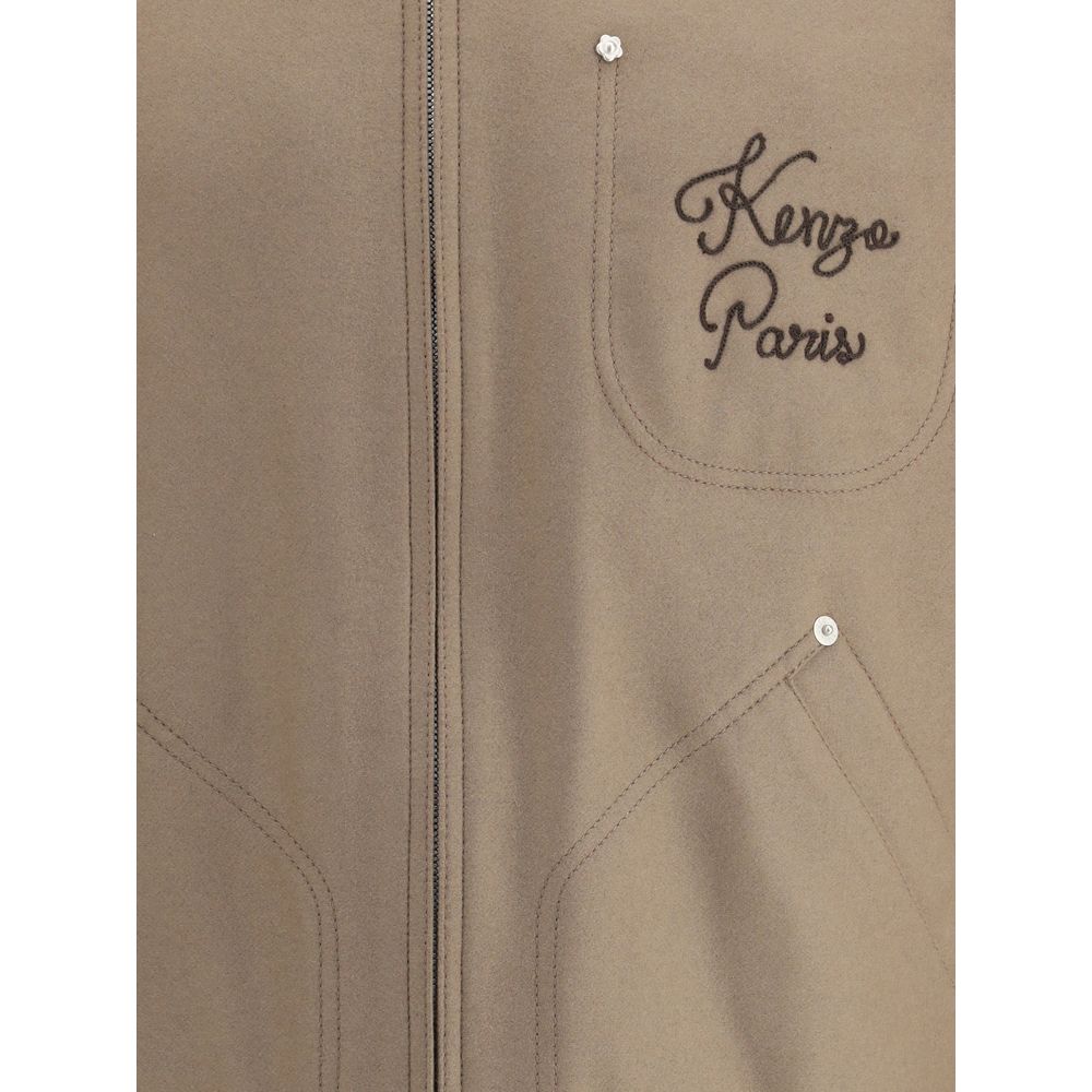 Close-up of Kenzo Brown Leather Jacket with embroidered logo and front pocket details.