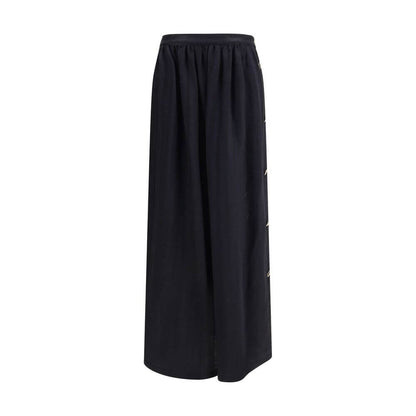 Kristina Ti Black Fleece Wool Long Skirt with golden geometric buttons on side closure, semi-wheeled design, elegant and timeless style.