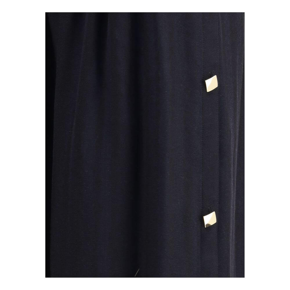 Close-up of Kristina Ti Black Fleece Wool Long Skirt with golden geometric buttons, showcasing elegant design and detailed craftsmanship.