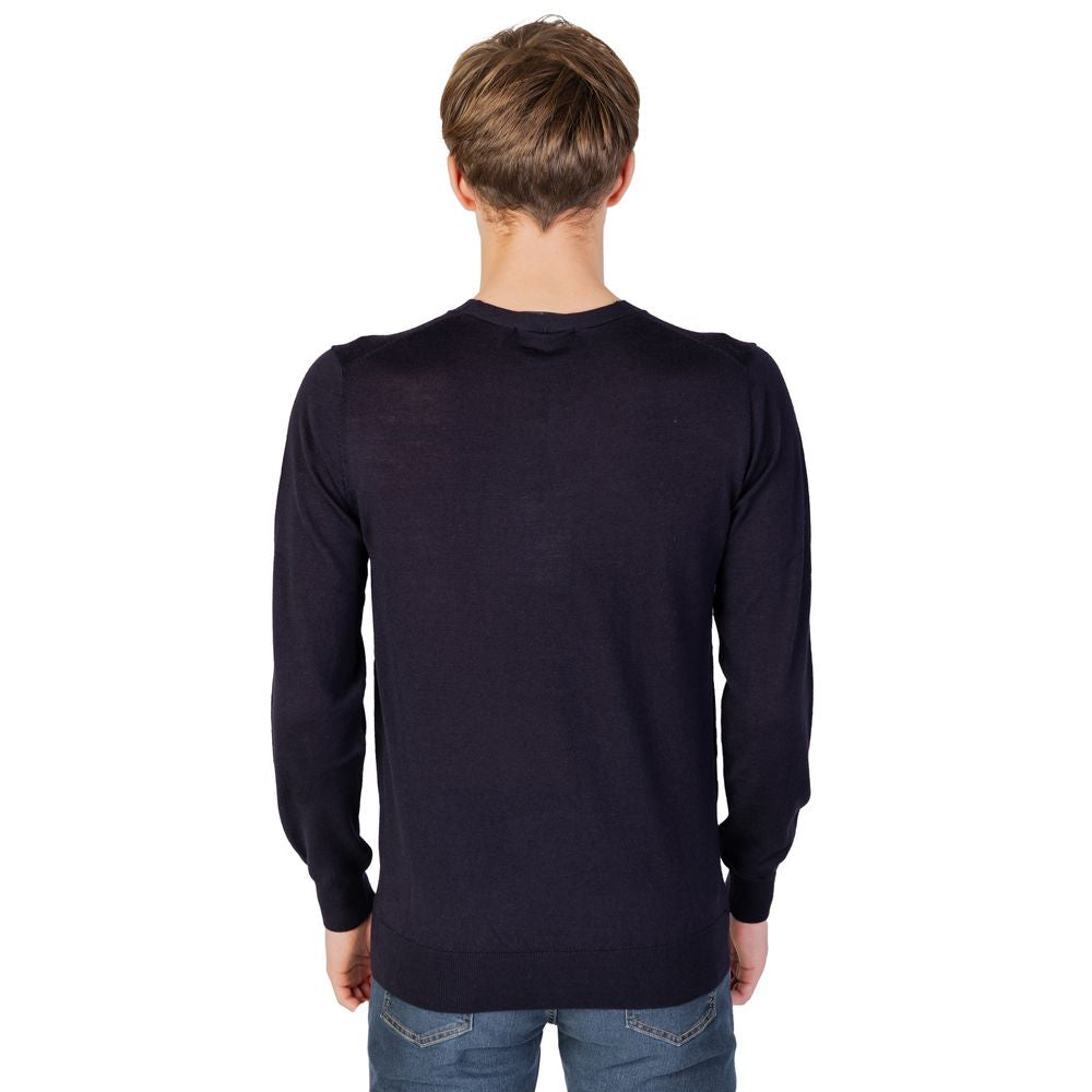 Man wearing Liu Jo Blue Cotton Sweatshirt, showcasing the back view and long sleeves, ideal for casual and formal looks.