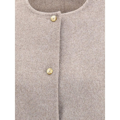 Close-up of Loulou De Saison Gray Wool Coat showing minimalist design and button closure.