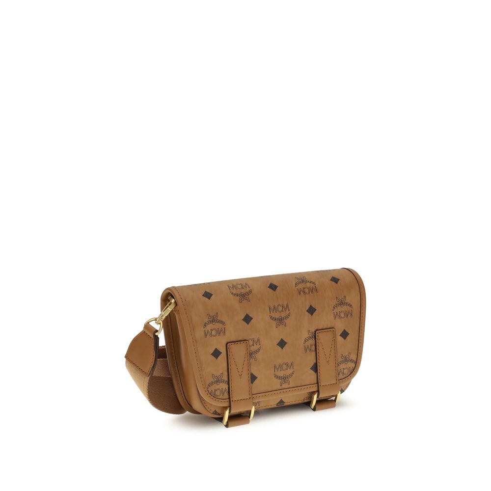 MCM Brown Fabric Shoulder Bag with rectangular silhouette and MCM logo print, showcasing elegance and craftsmanship.
